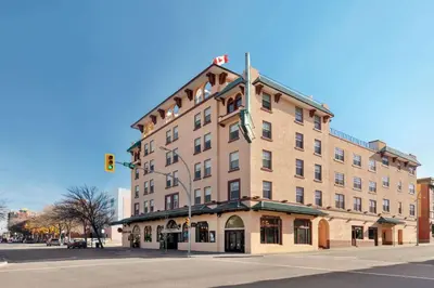 a building on the corner of a street with a traffic light at The Plaza Hotel Downtown, Trademark Collection by Wyndham in Kamloops