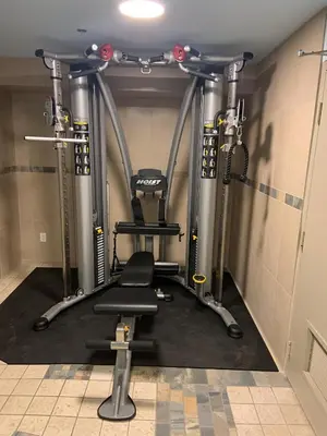a room with a gym with a treadmill at Blackcomb Lodge in Whistler