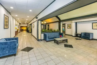 a lobby with couches and a table in a building at Comfort Inn & Suites in Edmonton