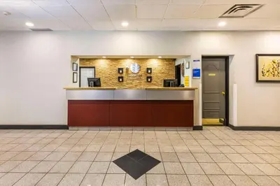 a lobby of a hospital with a reception counter at Comfort Inn & Suites in Edmonton