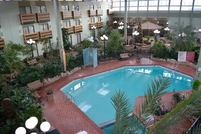 an overhead view of a swimming pool in a hotel at Baymont by Wyndham Red Deer in Red Deer