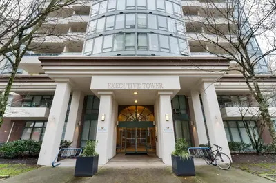 a building with the entrance to the executive tower at Executive Hotel Vancouver Airport in Richmond
