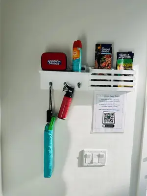 a white refrigerator with items on the door at Family Mountain Escape - Three Townhouses in One in Canmore