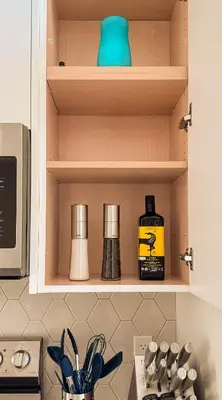 a kitchen shelf with items on it in a kitchen at Family Mountain Escape - Three Townhouses in One in Canmore
