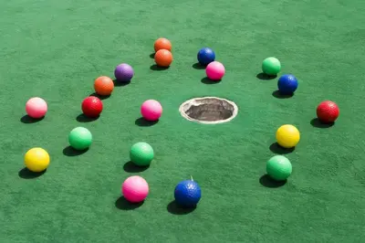 a group of balls on a pool table at Exceptional Boutique Cottage with Incredible Lake View in Kelowna