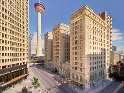 a view of a city with buildings and a tower at Fairmont Palliser in Calgary