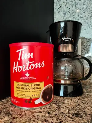 a red can of tim hortons sitting on a counter at WaterFalls Hotel - Suite in Falls Downtown with pool in Victoria