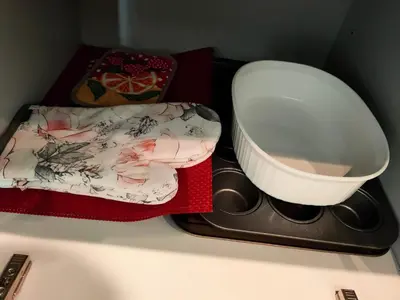a table with two trays with plates and a bowl at WaterFalls Hotel - Suite in Falls Downtown with pool in Victoria
