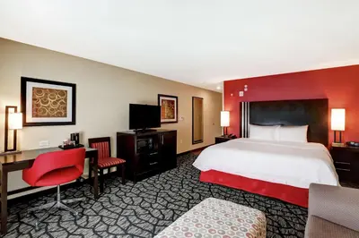 a hotel room with a bed and a desk at Hampton Inn by Hilton Chilliwack in Chilliwack
