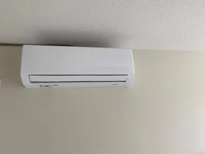 a white air conditioner hanging from a ceiling at Beautiful Bright with water view AC DT 2BR 2BTh 3BD sleeps 6 guests in Vancouver