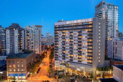 a view of a city at night with buildings at Best Western Premier Chateau Granville Hotel & Suites & Conference Centre in Vancouver