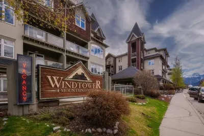 a sign for the windsormontmontmontmont apartment building at Hotel Room in Windtower Lodge-121 in Canmore
