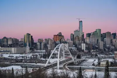 a view of a city with a bridge in the snow at Delta Hotels by Marriott Edmonton Centre Suites in Edmonton