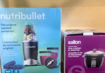 a box of a blender next to a box at Mountain View Escape with Private Hot Tub & Patio in Canmore