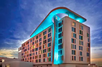 a building with blue lights on top of it at Renaissance Edmonton Airport Hotel in Nisku
