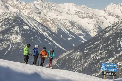 a group of people standing on top of a snow covered mountain at Chic Retreat, Modern, Pool, Hot Tub, Gym in Invermere