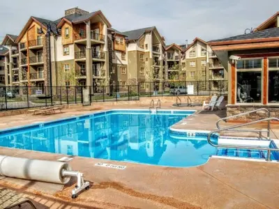 an image of a swimming pool at a apartment complex at Chic Retreat, Modern, Pool, Hot Tub, Gym in Invermere