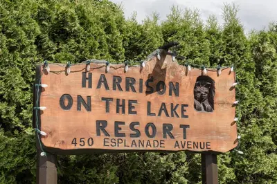 a sign that says harlem on the lake resort at Harrison On The Lake, Walkable to Beach and Village in Harrison Hot Springs