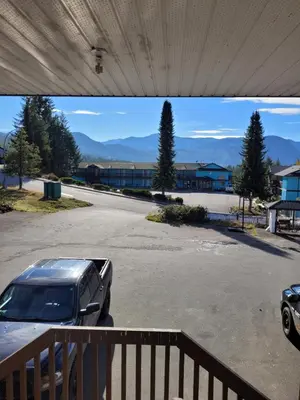 a parking lot with a car parked in it at Ridgeview Motor Inn in Gold River