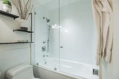 a bathroom with a shower and a toilet at Powderview 24 by Outpost Whistler in Whistler