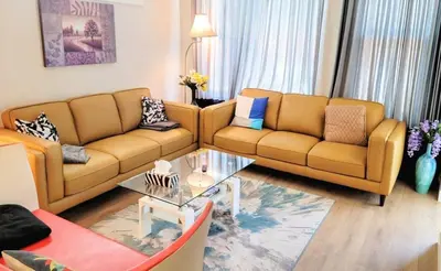 a living room with two couches and a coffee table at Brand New 3-Bedroom Home in a Quiet Neighborhood in Calgary