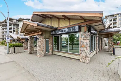 a store front with a sign that reads great suites at Beautiful 2 bedroom town home in Sunrise Ridge in Parksville