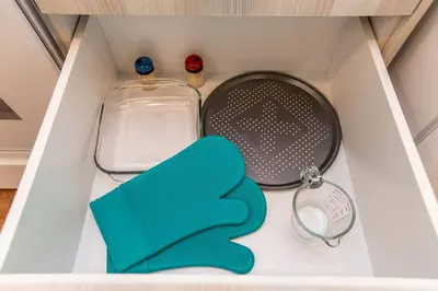 a drawer with a spatula and a strainer at Spacious 2bedroom FREE parking king bed close to DT in Edmonton