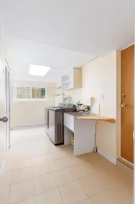 a kitchen with a sink and a counter at LOVELY 3 bedroom PORT MOODY spacious home 6 people free parking in Port Moody