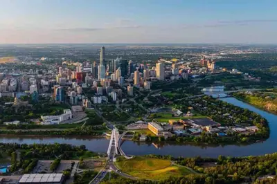 an aerial view of a city with a river and a bridge at Steamy Romantic Greek Corneer Suite King U/G Wifi in Edmonton
