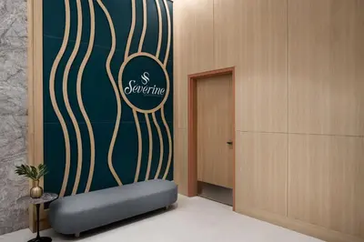 a room with a wall with a sign on it at Delta Hotels by Marriott Vancouver Delta in Delta