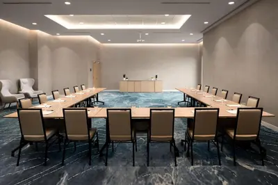 a conference room with a long table and chairs at Delta Hotels by Marriott Vancouver Delta in Delta