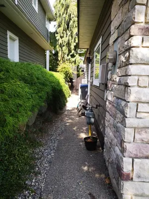 a parking meter on the side of a house at Jimmy B&B in Surrey