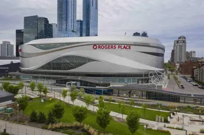 a large building with a rogersride sign on it in a city at Hot Arabaian NightsCornerPNHSEkingWifiU/G in Edmonton