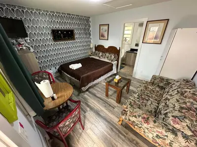 a living room with a bed and a couch at Guest Suite - Private Retreat - J-1 in Abbotsford