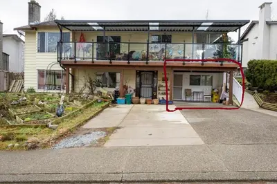 a house with a balcony on top of it at Guest Suite - Private Retreat - J-1 in Abbotsford