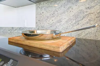 a bowl and spoon sitting on top of a counter at Stylish 1BR, Stampede & Free Parking by Doorbed in Calgary