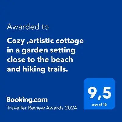 a screenshot of a cell phone with the text upgraded to cozy apartment cottage in at Cozy ,artistic cottage in a garden setting close to the beach and hiking trails. in Powell River