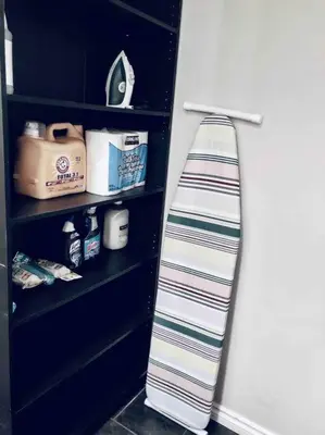 a tie hanging from a refrigerator door in a room at 2 BDRM A/C Condo w/Ensuite Laundry + Free Parking in Edmonton