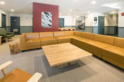 a living room with a couch and a coffee table at The Approach Hotel in Panorama
