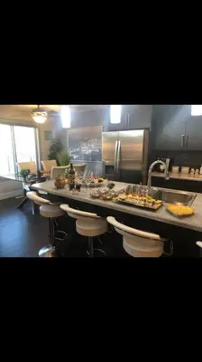 a kitchen with a counter with food on it at Cozy and beautiful 3 bedroom house close to lake in Edmonton