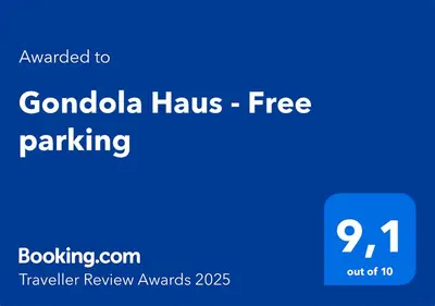 a blue sign that reads gonzalo haus free parking at Gondola Haus - Free parking in Whistler