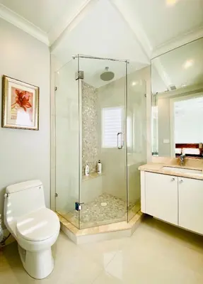 a bathroom with a shower and a toilet and a sink at Vancouver Shangrila House in Richmond