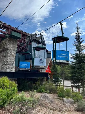 a gondola ride at a ski resort at Perfect Ski or Bike in-out Hot Tub Pool in Panorama