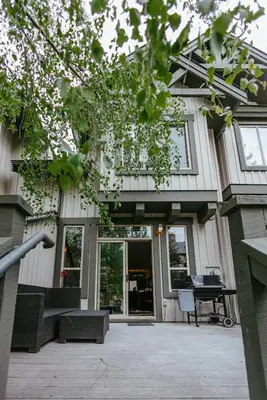 a house with a front door with a porch at Hearthstone Townhomes by StayIn in Panorama