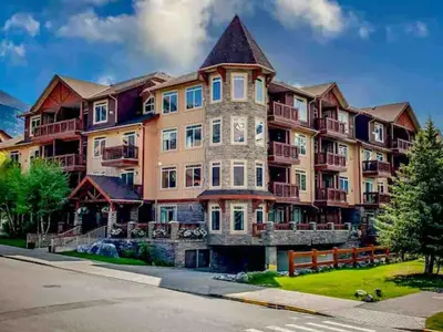 an exterior view of a large apartment building at Falcon Crest Lodge 1 BR Condo With Gym & Hot-Tubs & Mountain View in Canmore