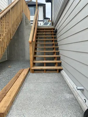 a set of stairs leading up to a house at Zen Retreat Langford in Victoria