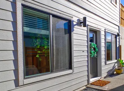 a house with a window and a door at Zen Retreat Langford in Victoria