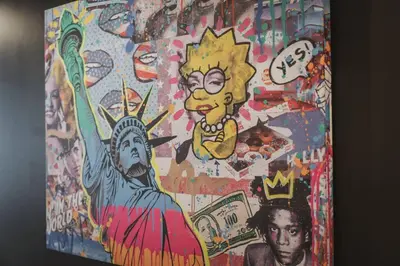 a wall with a painting of the statue of liberty at NYC Loft Inspired •12 mins to WEM •Vintage arcade in Edmonton