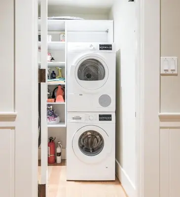 a laundry room with a washer and dryer at Vancouver Golf Villa - Private Oasis in Vancouver