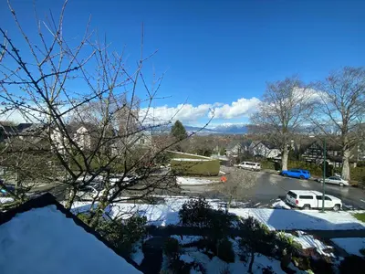 a view of a parking lot with snow on the ground at Cozy Dunbar 3 Beds Home w/ Views in Vancouver